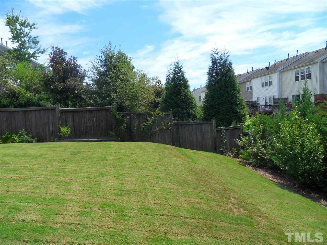 5327 Griffith Park Road Raleigh, NC 27613 - Photo 5 of 25 a backyard of a house with lots of green space