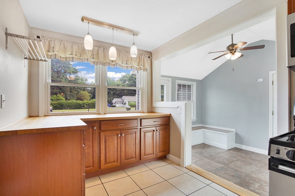 65 Bartels Street Springfield, MA 01128 - Photo 6 of 42 a large bathroom with a granite countertop sink a toilet a mirror and shower