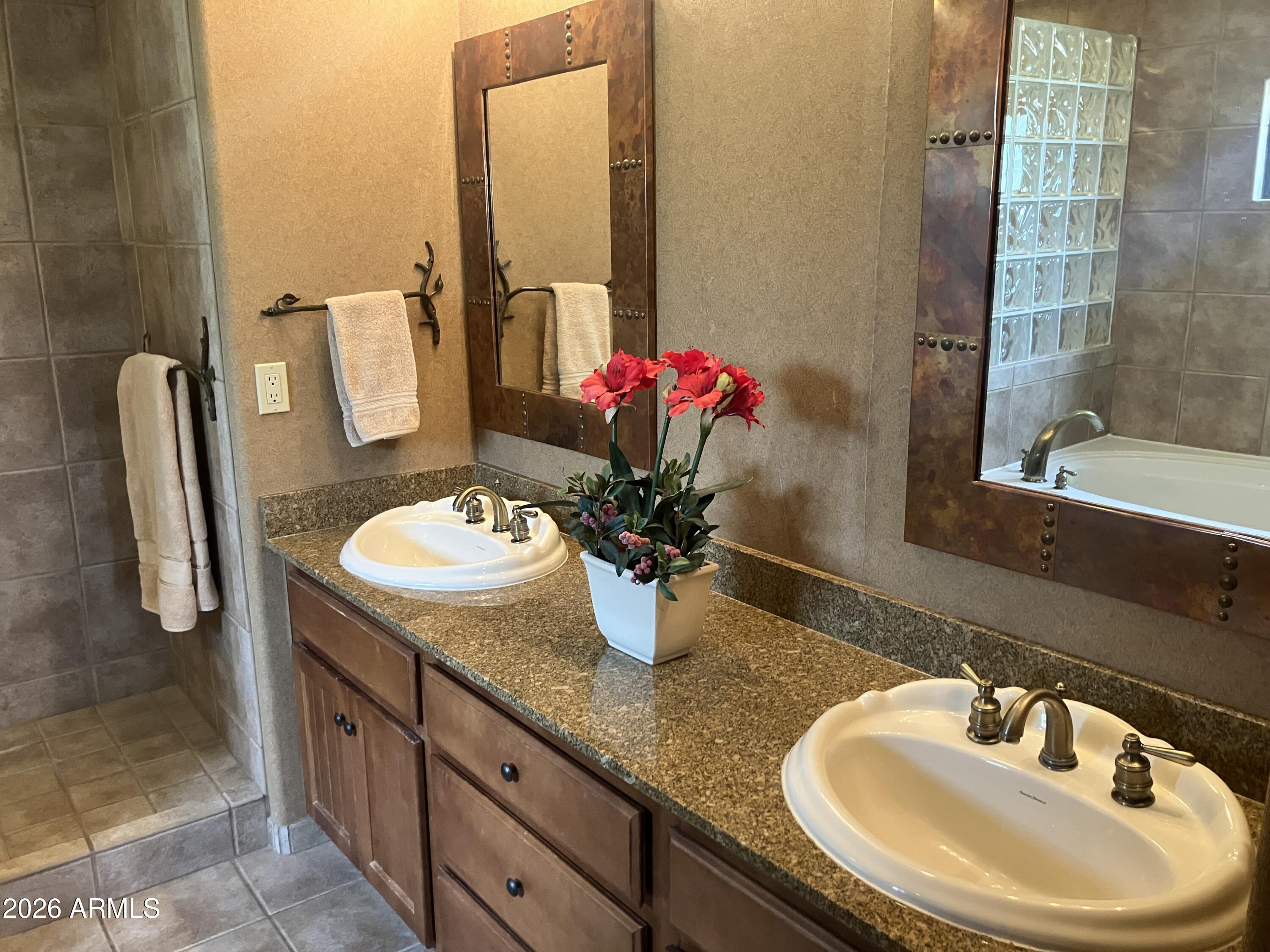 36601 North Mule Train Road, Unit 13D Carefree, AZ 85377 - Photo 17 of 51 a bathroom with a granite countertop sink and a mirror
