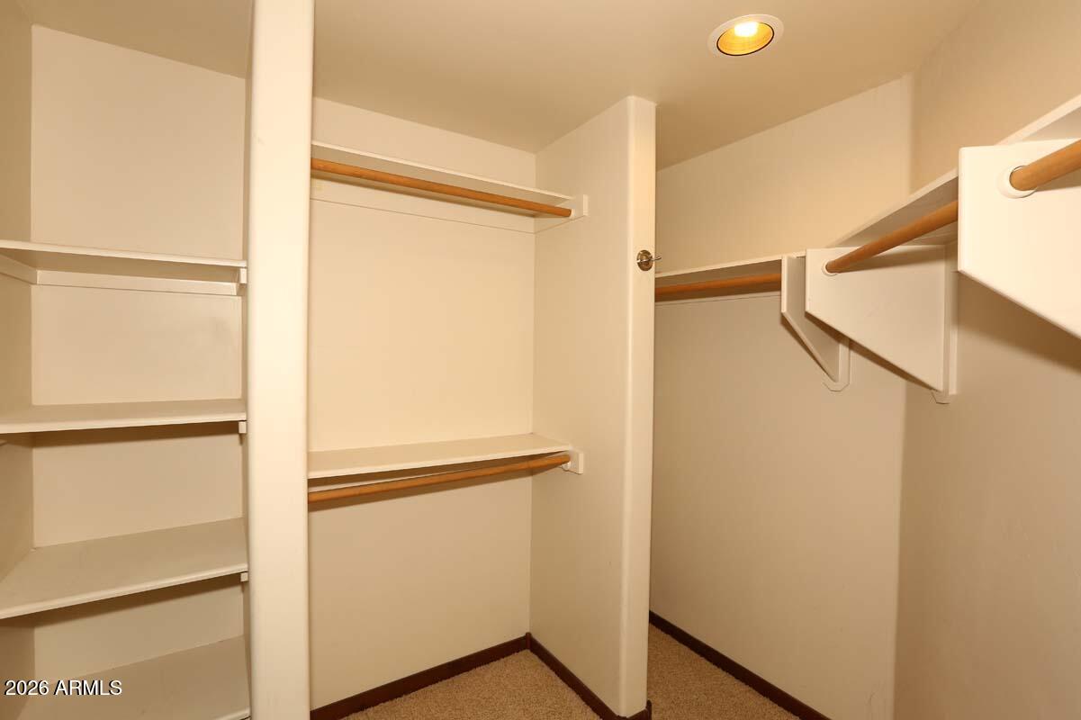 36601 North Mule Train Road, Unit 13D Carefree, AZ 85377 - Photo 21 of 51 a view of walk in closet with empty racks