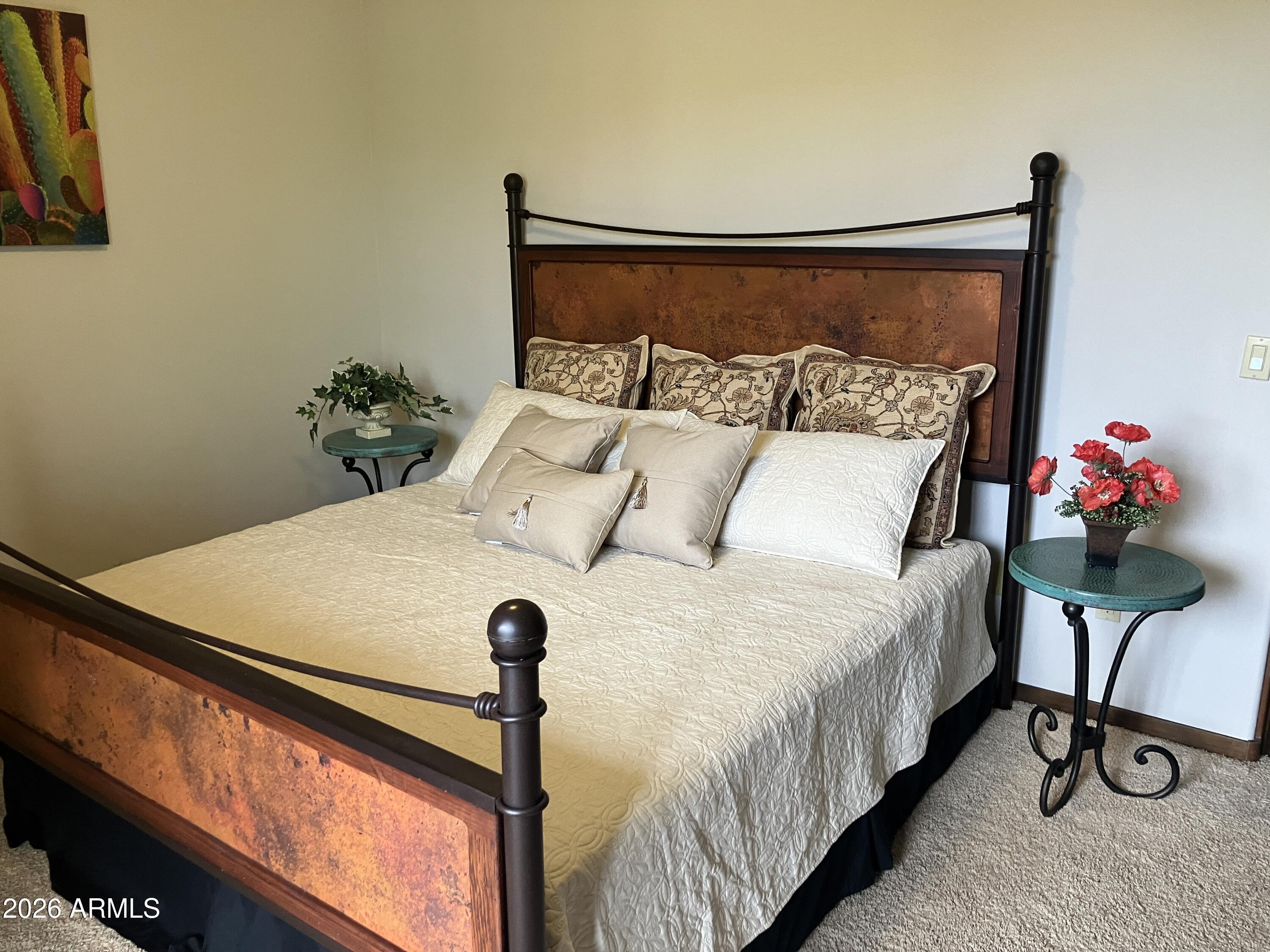 36601 North Mule Train Road, Unit 13D Carefree, AZ 85377 - Photo 23 of 51 a bedroom with a bed and a potted plant