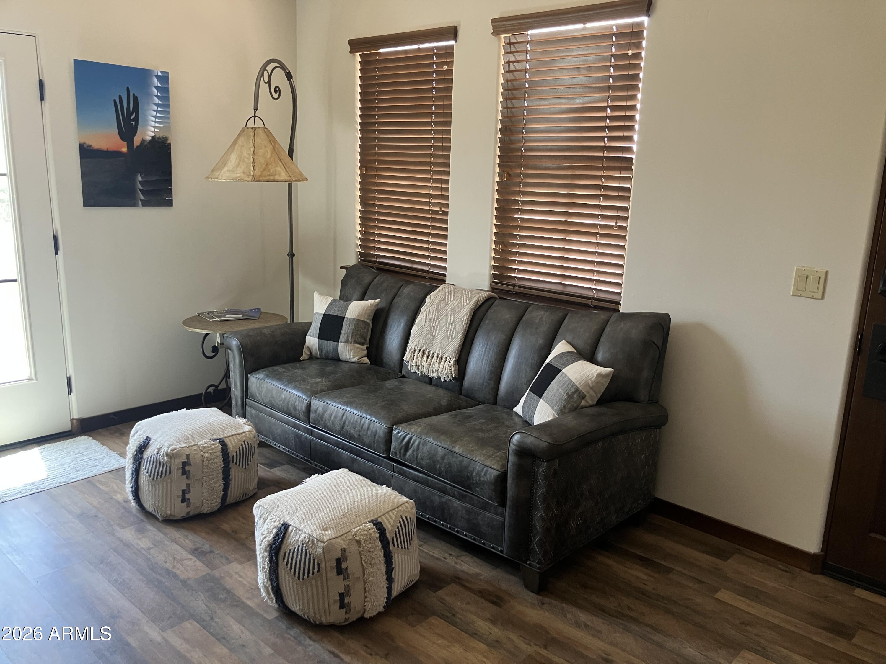 36601 North Mule Train Road, Unit 13D Carefree, AZ 85377 - Photo 29 of 51 a living room with furniture and a window