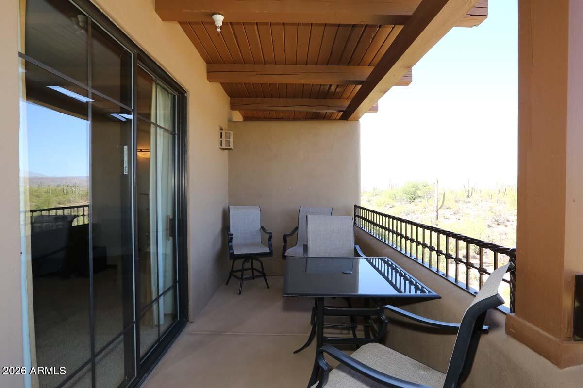 36601 North Mule Train Road, Unit 13D Carefree, AZ 85377 - Photo 38 of 51 a view of a balcony with chairs