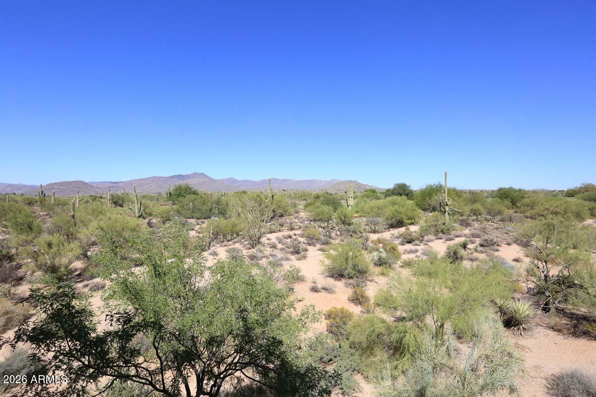 36601 North Mule Train Road, Unit 13D Carefree, AZ 85377 - Photo 42 of 51 a view of a city with lush green forest