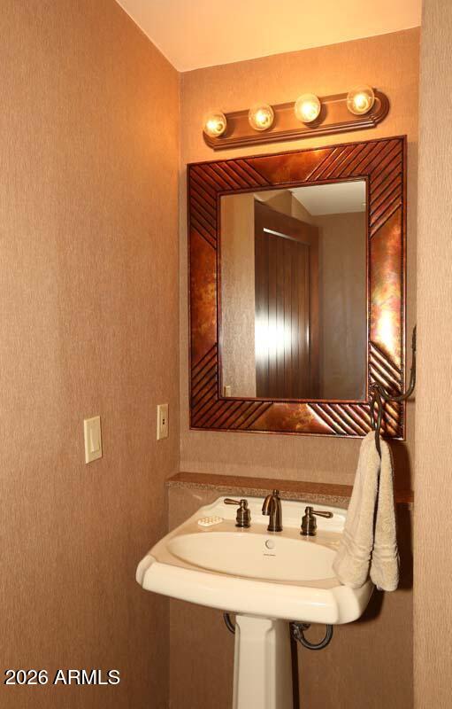 36601 North Mule Train Road, Unit 13D Carefree, AZ 85377 - Photo 48 of 51 a bathroom with a sink and a mirror