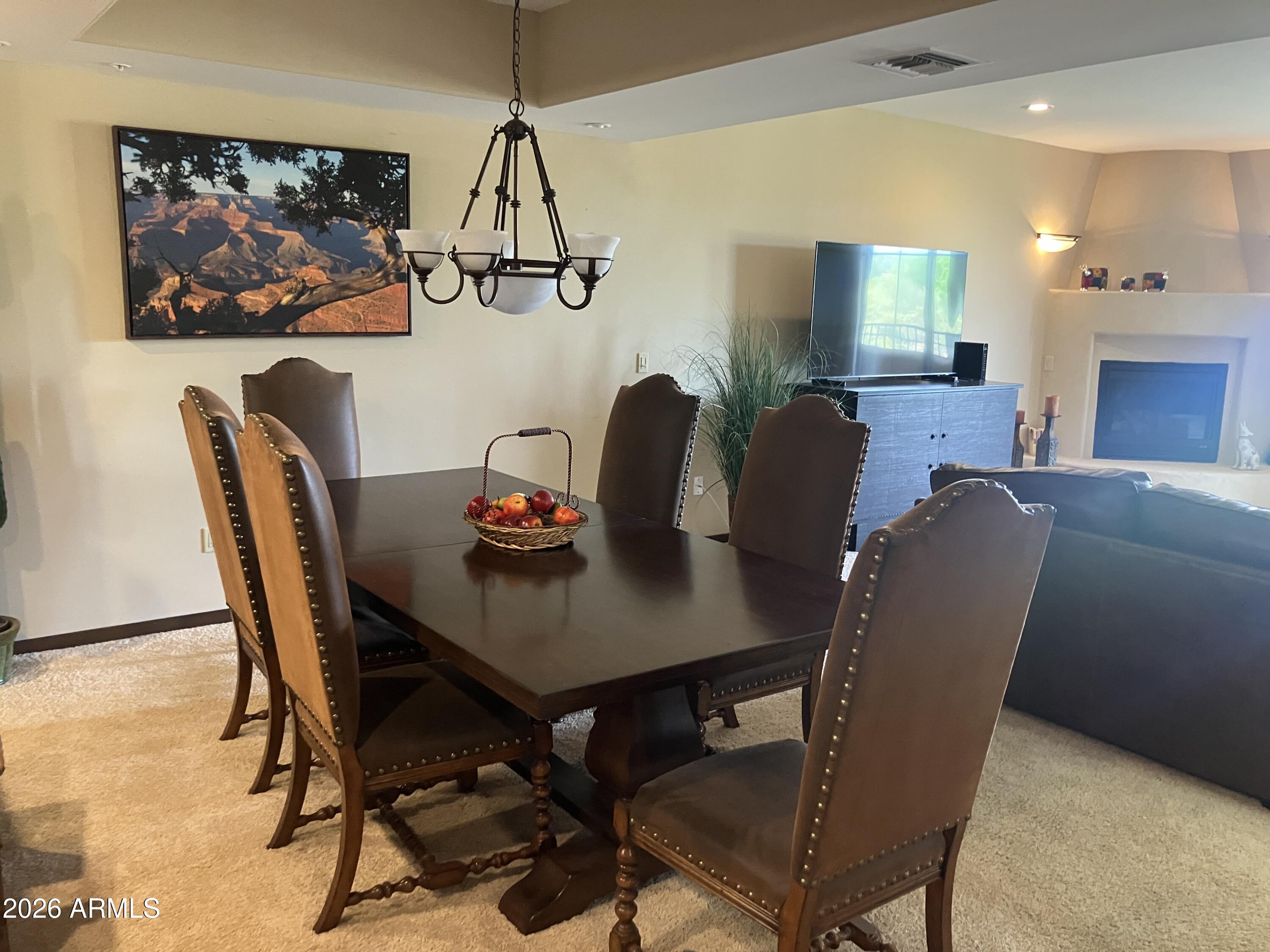 36601 North Mule Train Road, Unit 13D Carefree, AZ 85377 - Photo 10 of 51 a view of a dining room with furniture