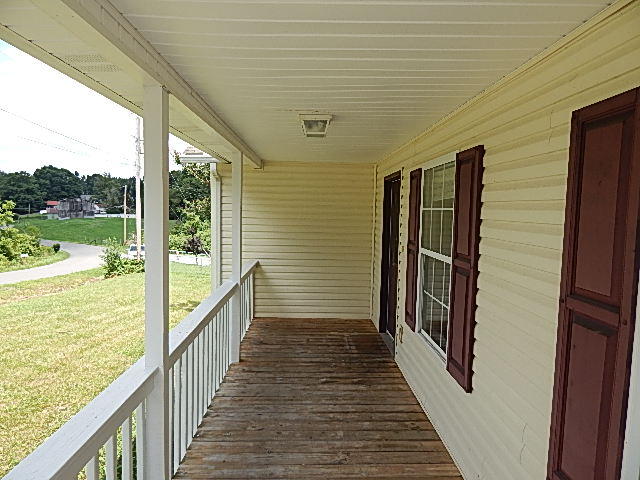 812 Coolidge Road La Follette, TN 37766 - Photo 5 of 11 Covered Front Porch