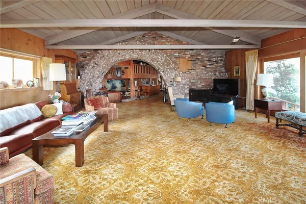 a view of livingroom with furniture and sitting area