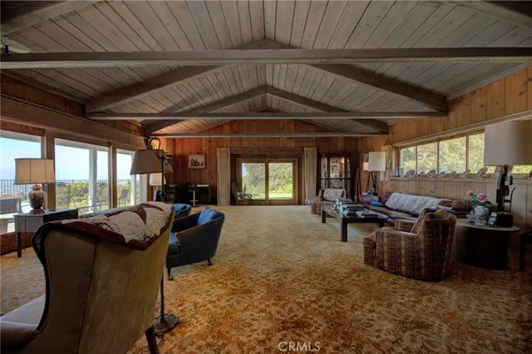 a view of a livingroom with furniture