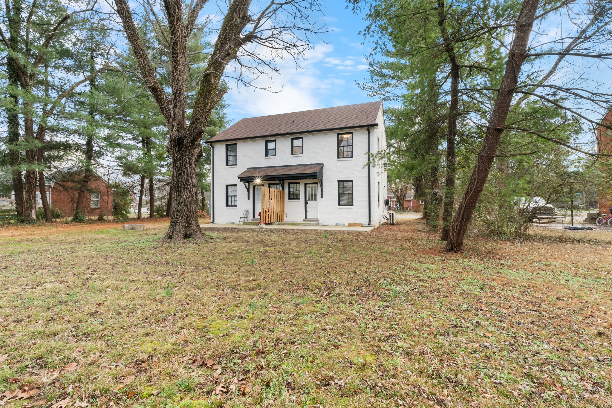 1815 Ragland Avenue Murfreesboro, TN 37130 - Photo 14 of 15 a front view of a house with a yard