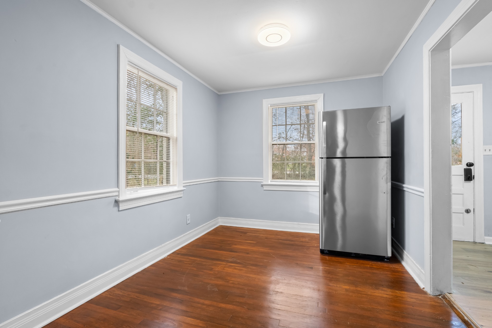 1815 Ragland Avenue Murfreesboro, TN 37130 - Photo 5 of 15 a view of empty room with wooden floor and window
