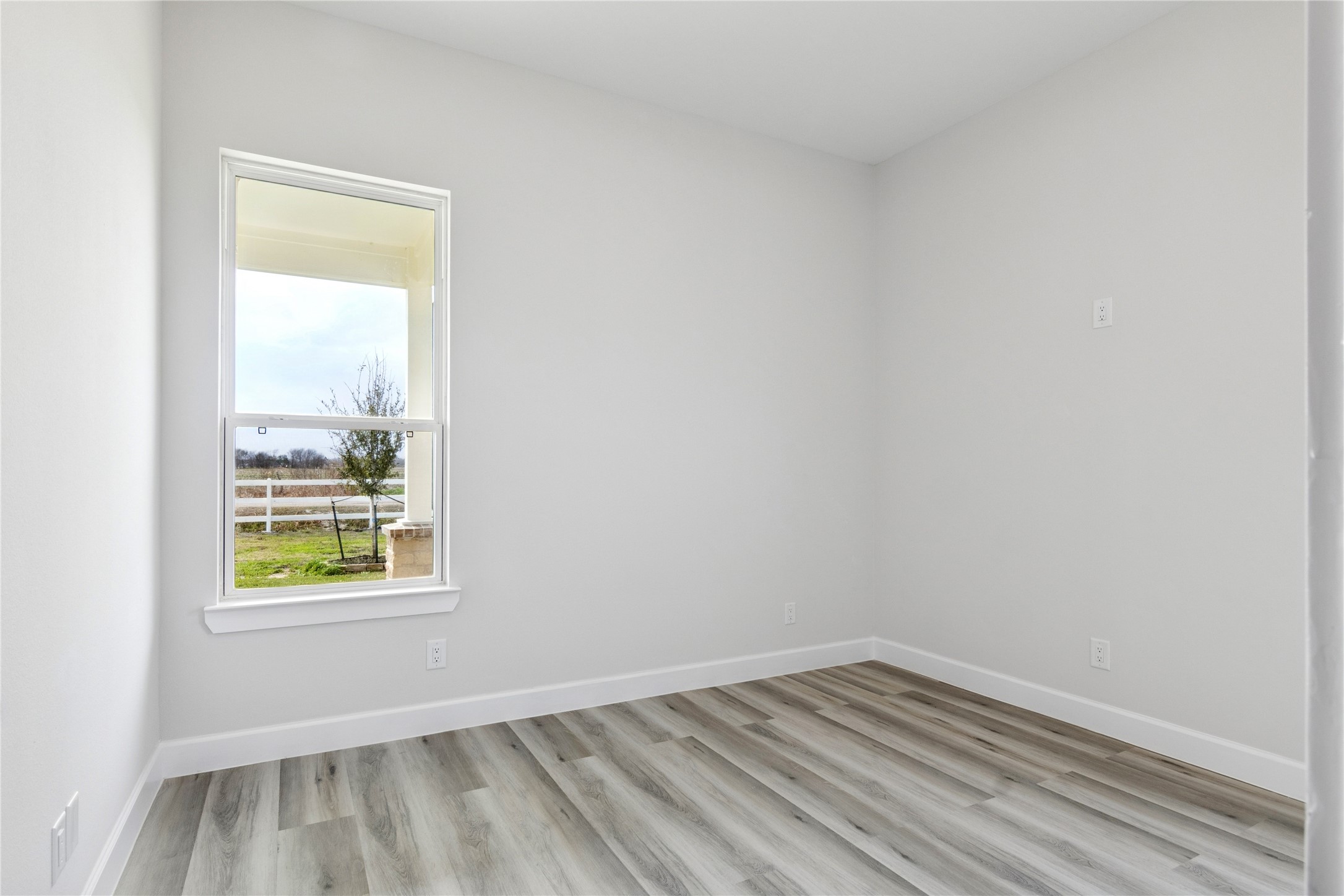 5766 Ward Bend Road Sealy, TX 77474 - Photo 23 of 45 an empty room with a window