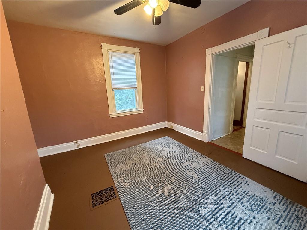 14 Shank Street Pittsburgh, PA 15212 - Photo 12 of 30 a view of an empty room with window and wooden floor