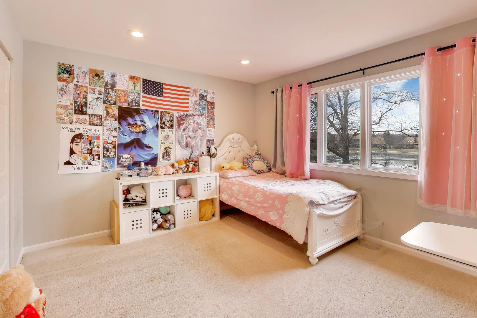 654 Picardy Circle Northbrook, IL 60062 - Photo 15 of 26 a bedroom with a bed and a large window