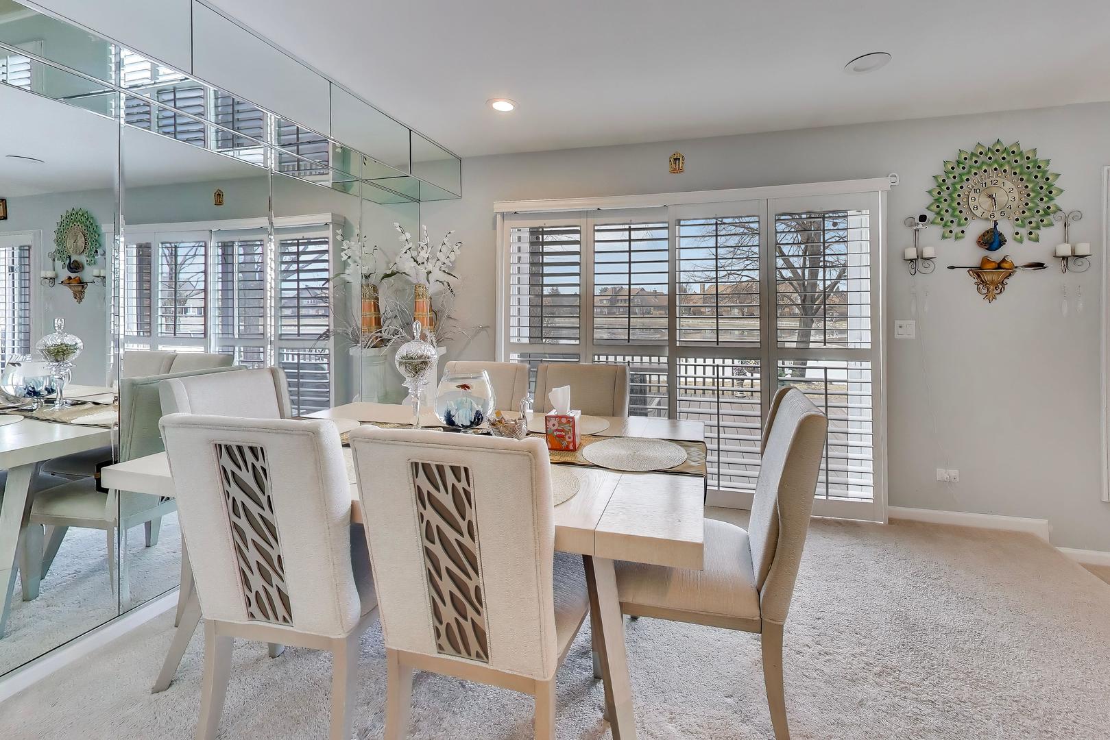 654 Picardy Circle Northbrook, IL 60062 - Photo 6 of 26 a view of a dining room with furniture window and outside view