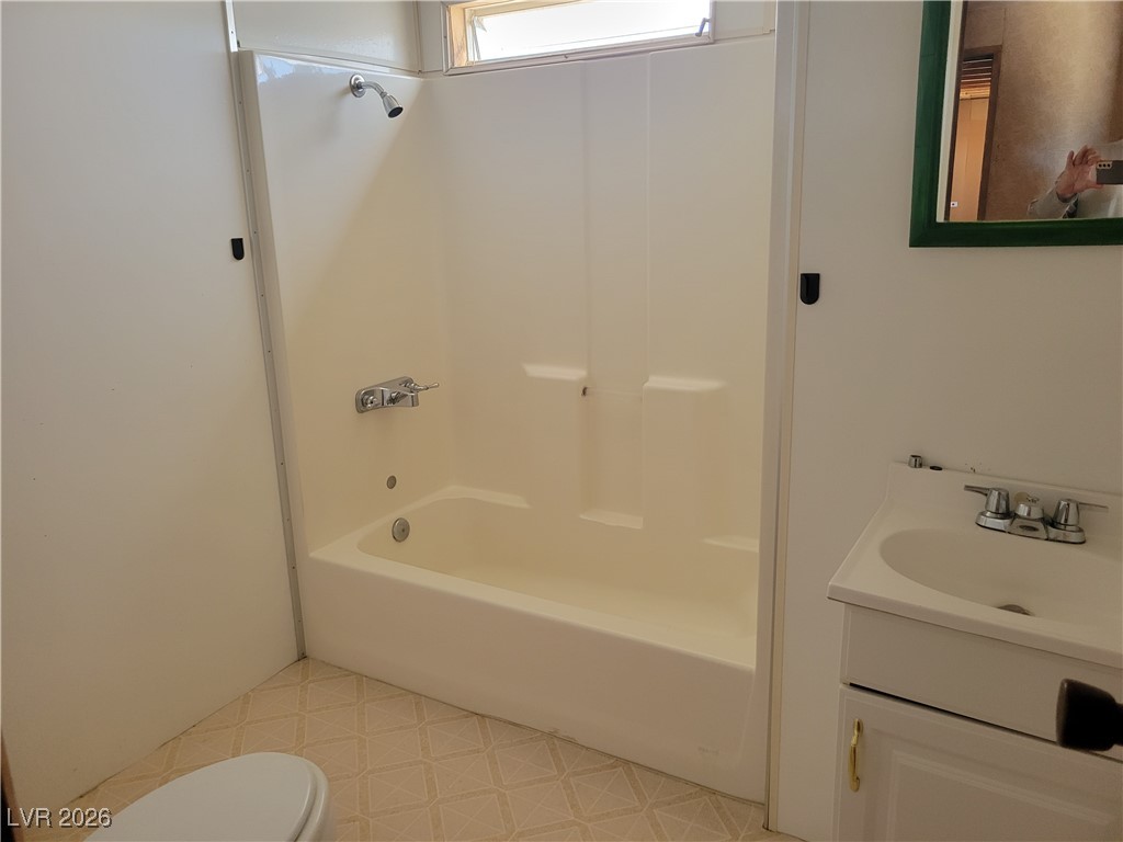 7950 South Wildhorse Road Pahrump, NV 89061 - Photo 20 of 28 Bathroom featuring vanity and tub / shower combination
