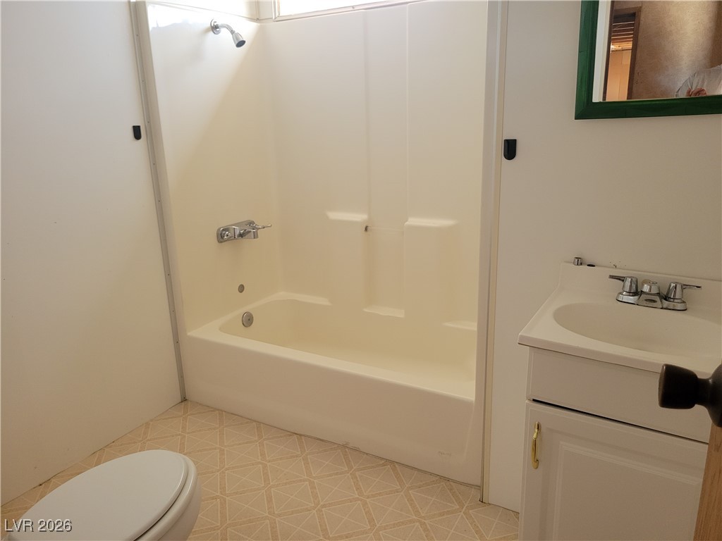 7950 South Wildhorse Road Pahrump, NV 89061 - Photo 21 of 28 Bathroom with vanity and tub / shower combination