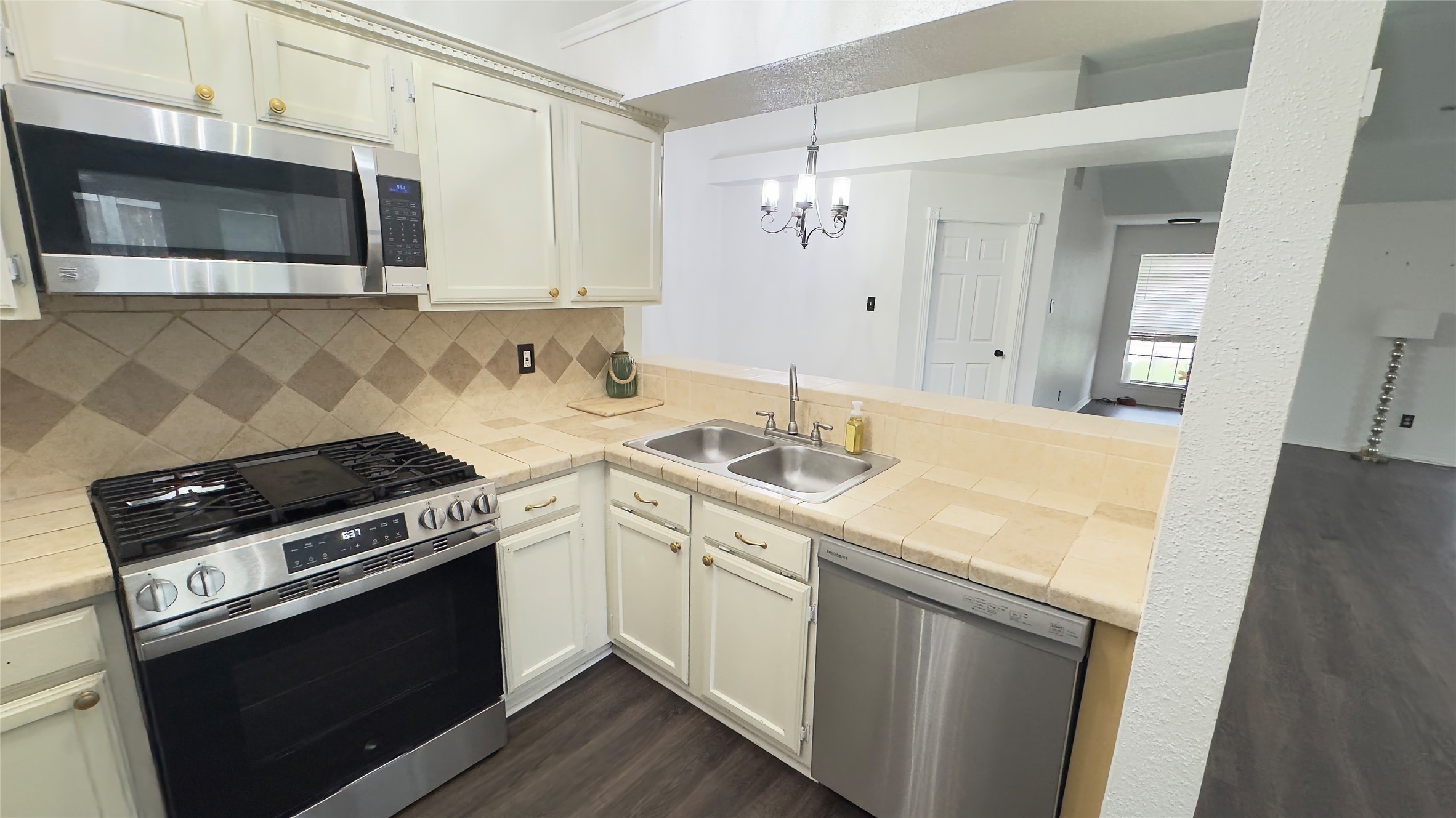 1918 Medway Drive Spring, TX 77386 - Photo 13 of 22 New Stainless gas stove and dishwasher installed in 2025
