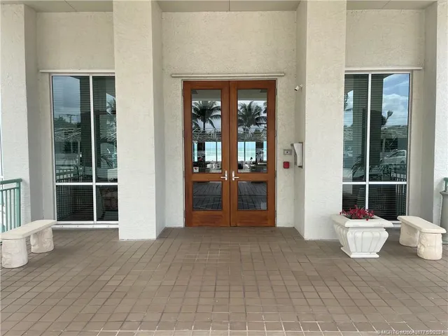 a view of empty room with windows