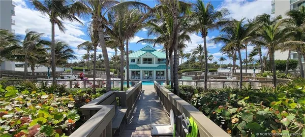 a view of balcony and wooden floor
