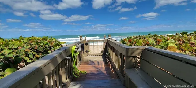 a view of balcony and wooden floor
