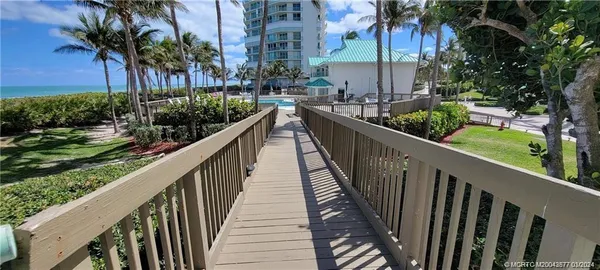 a view of balcony and yard