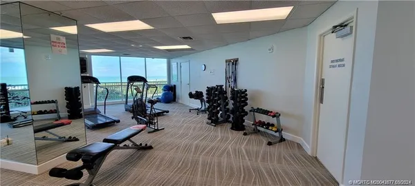 a view of a room with gym equipment