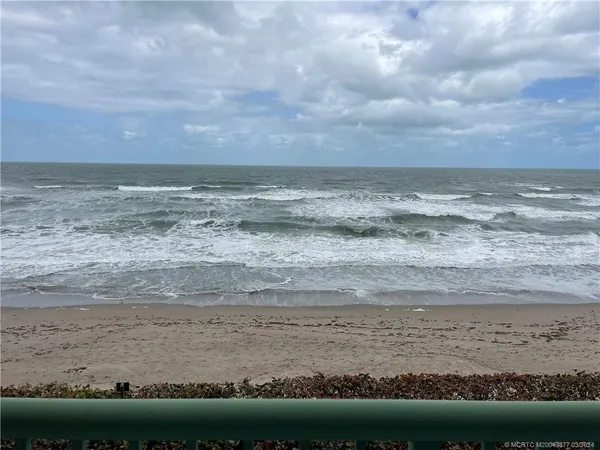 a view of beach and ocean