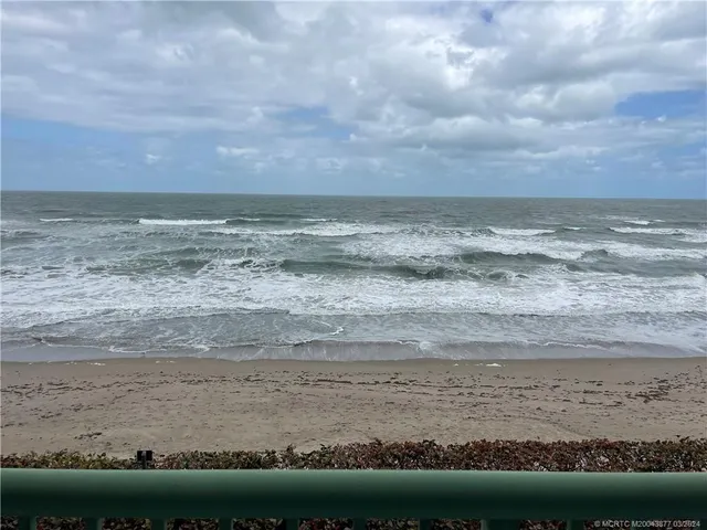 a view of beach and ocean