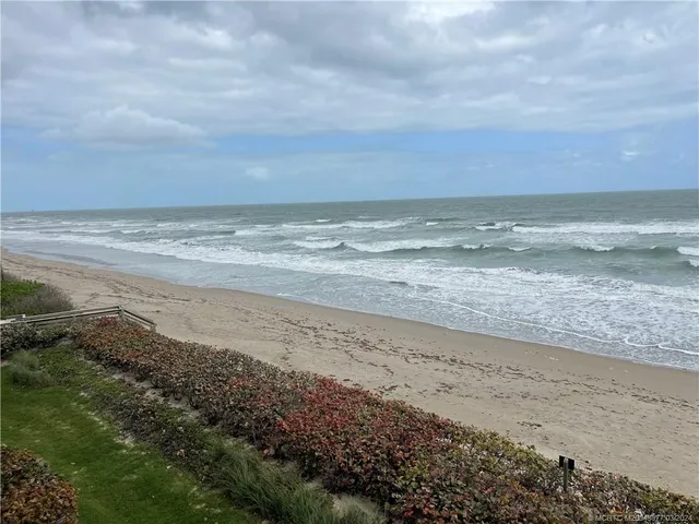 a view of beach and ocean