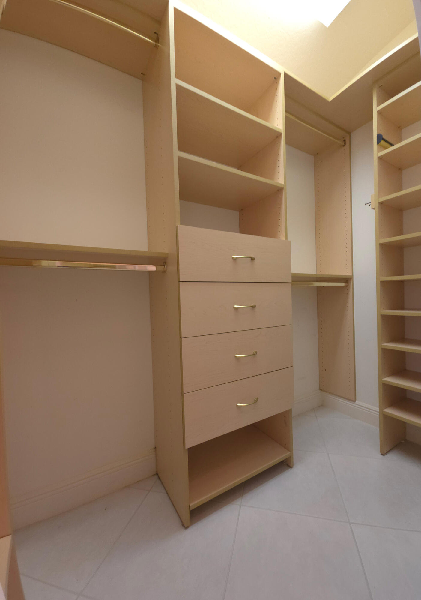 11853 Grove Ridge Lane Boynton Beach, FL 33437 - Photo 29 of 59 a view of an empty walk in closet