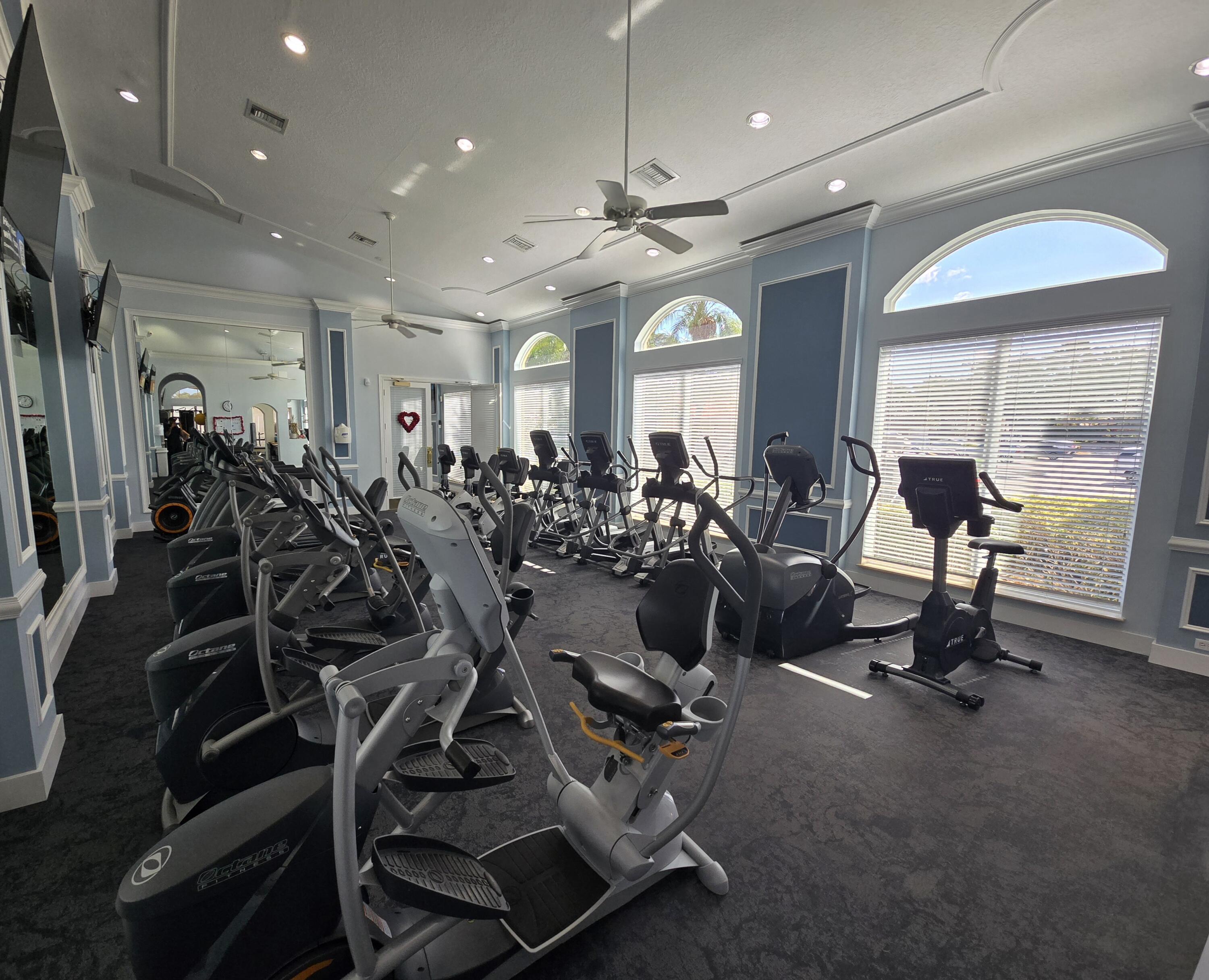11853 Grove Ridge Lane Boynton Beach, FL 33437 - Photo 40 of 59 a view of a room with gym equipment