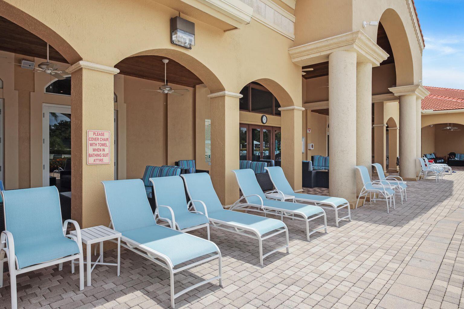 11853 Grove Ridge Lane Boynton Beach, FL 33437 - Photo 56 of 59 a view of living room kitchen and dining area