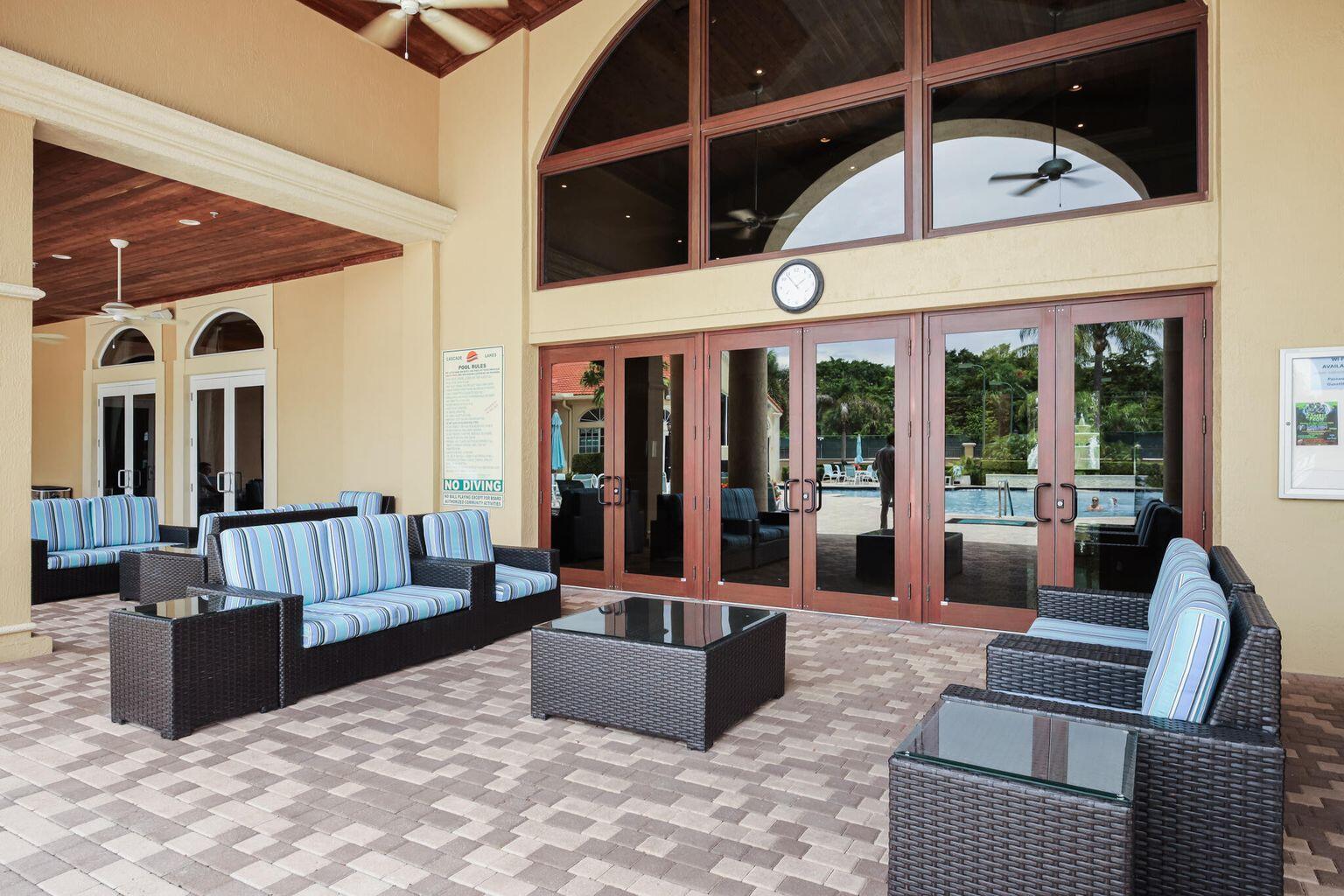 11853 Grove Ridge Lane Boynton Beach, FL 33437 - Photo 57 of 59 a view of an outdoor seating
