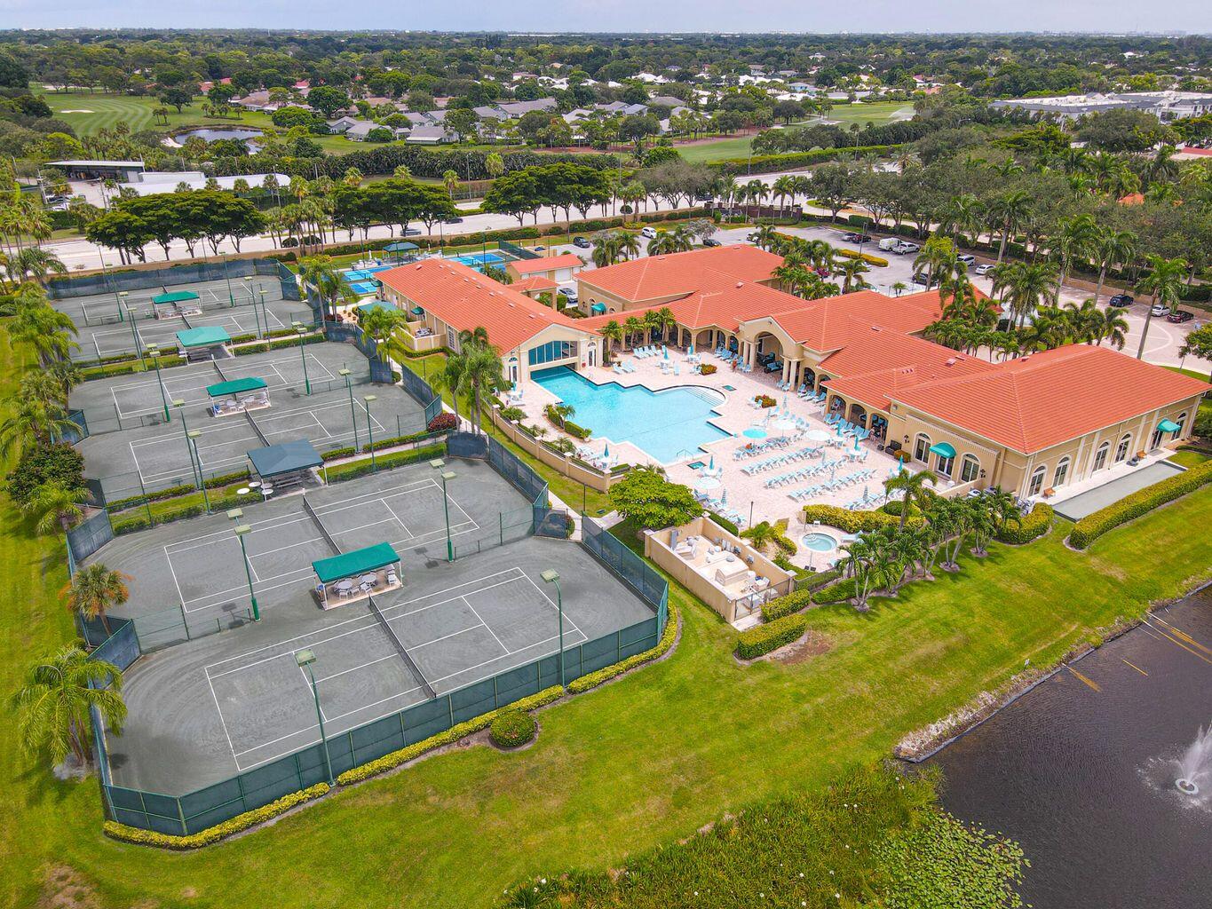 11853 Grove Ridge Lane Boynton Beach, FL 33437 - Photo 59 of 59 an aerial view of residential houses with outdoor space