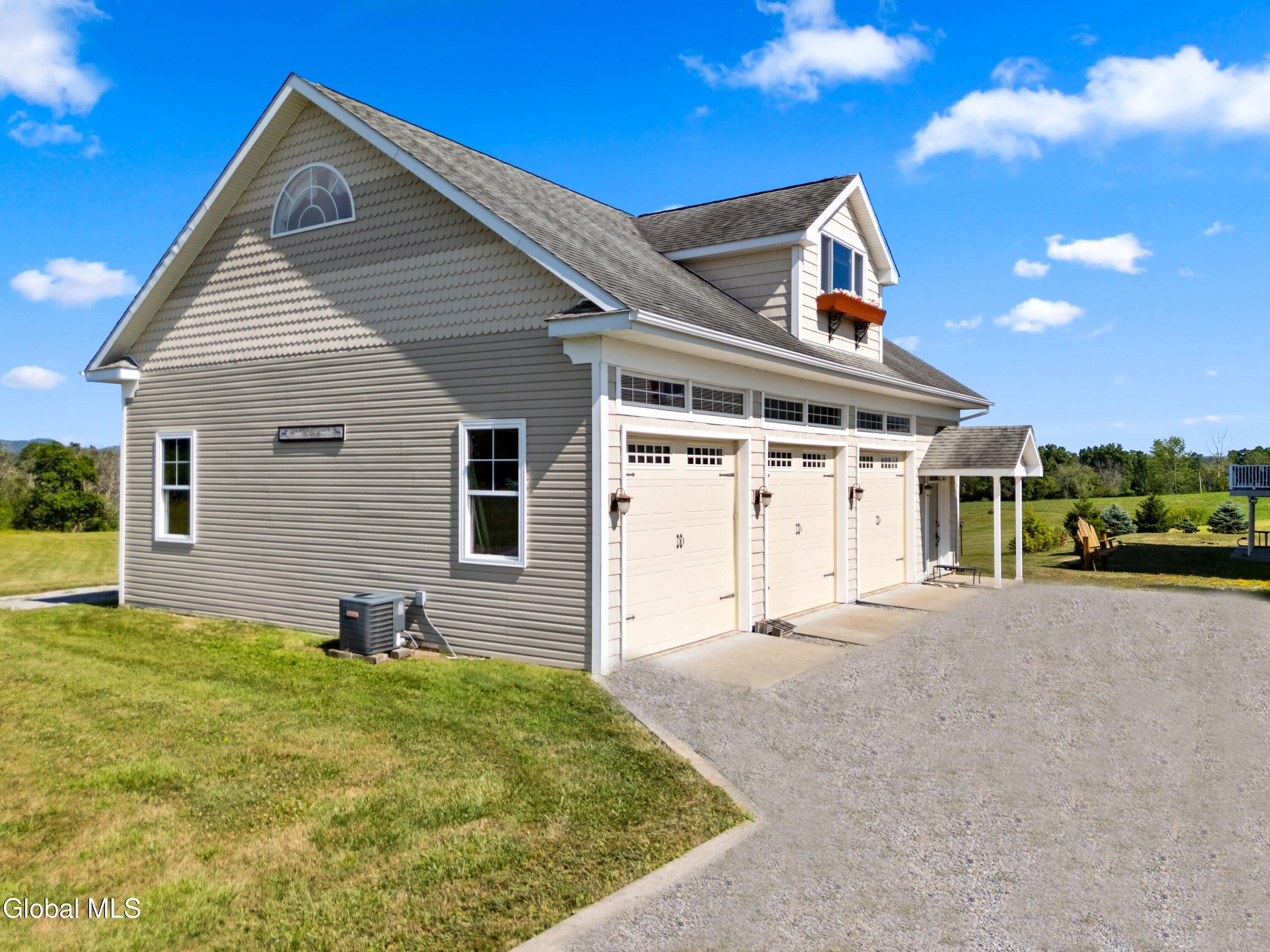 85 Harris Road Northumberland, NY 12871 - Photo 35 of 46 4 car garage with cottage above