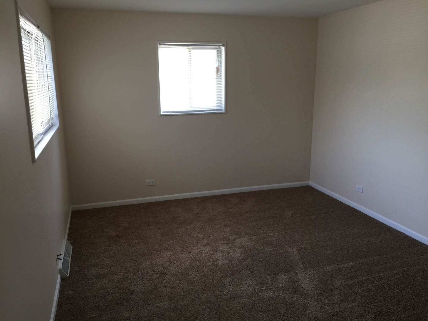 8010 West Lyons Street, Unit B Niles, IL 60714 - Photo 12 of 19 an empty room with a window