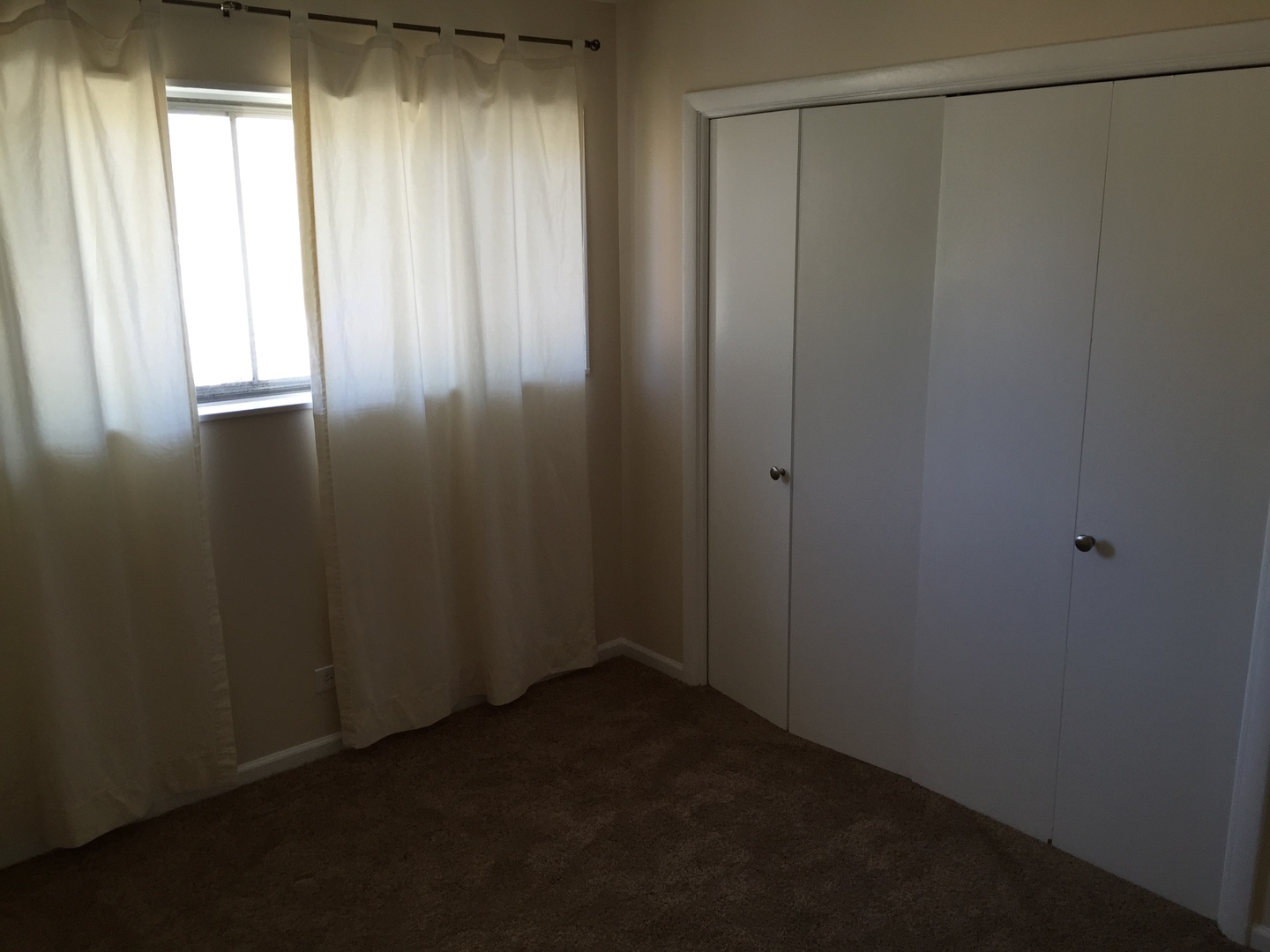 8010 West Lyons Street, Unit B Niles, IL 60714 - Photo 13 of 19 a view of an empty room with windows