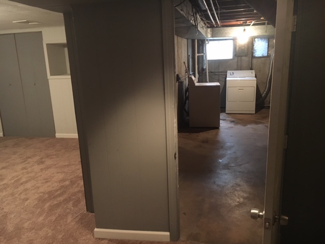 8010 West Lyons Street, Unit B Niles, IL 60714 - Photo 17 of 19 a view of hallway with washer and dryer