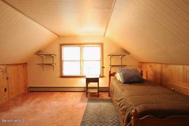 51 Main Road Monterey, MA 01230 - Photo 12 of 17 a bedroom with a bed and a window with outer view