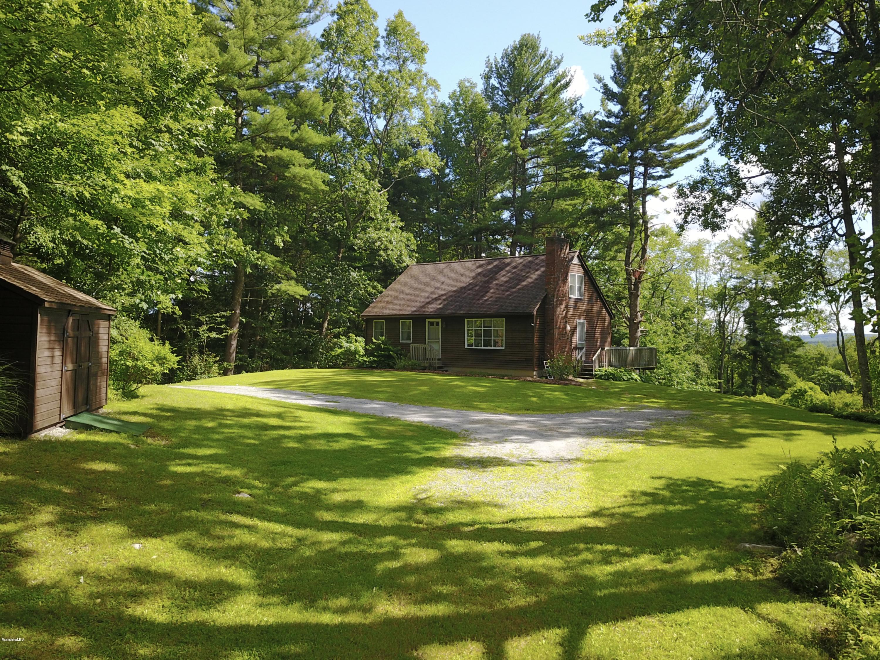 51 Main Road Monterey, MA 01230 - Photo 16 of 17 a view of a house with a big yard