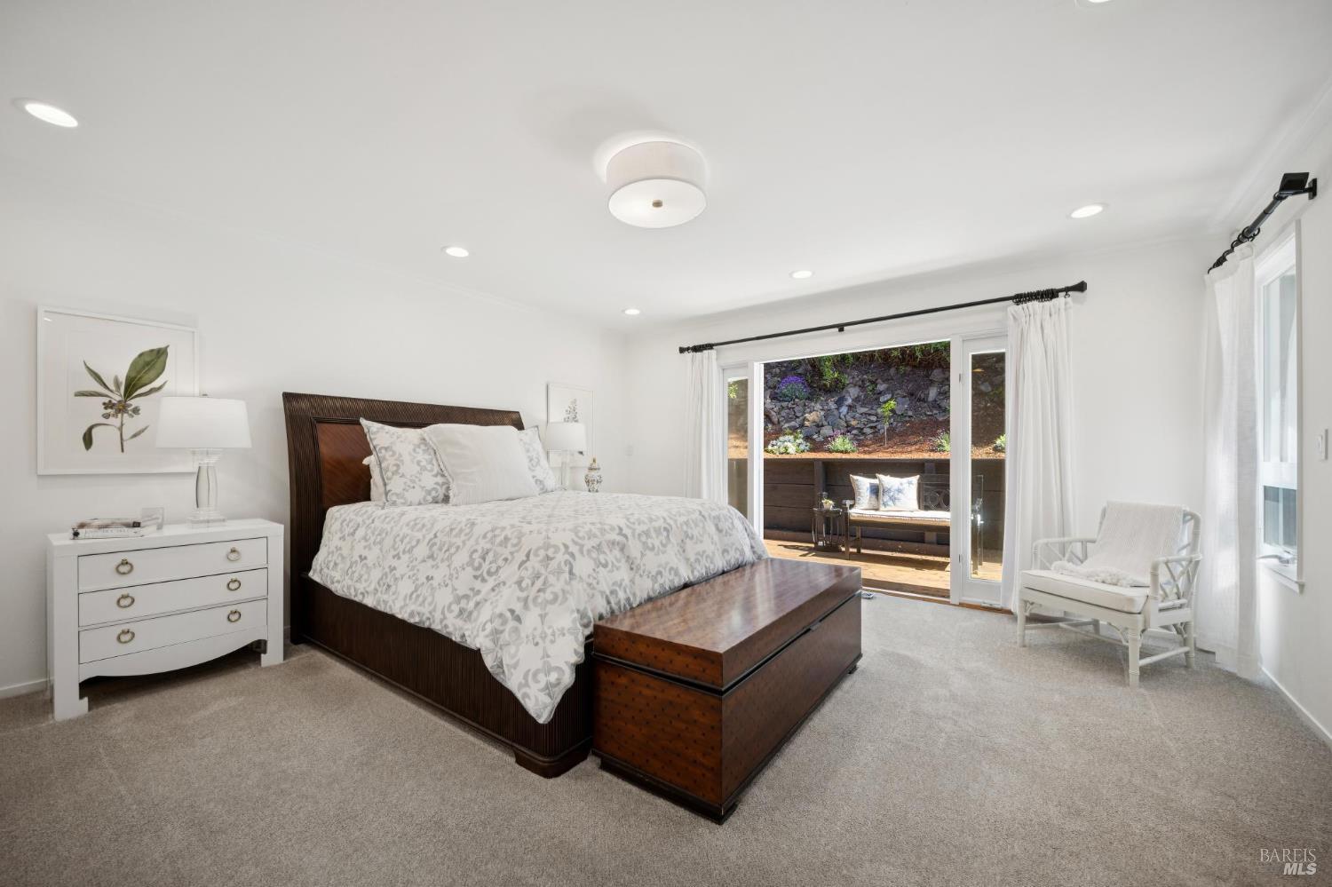 1380 Grand Avenue San Rafael, CA 94901 - Photo 22 of 46 a spacious bedroom with a bed and a window