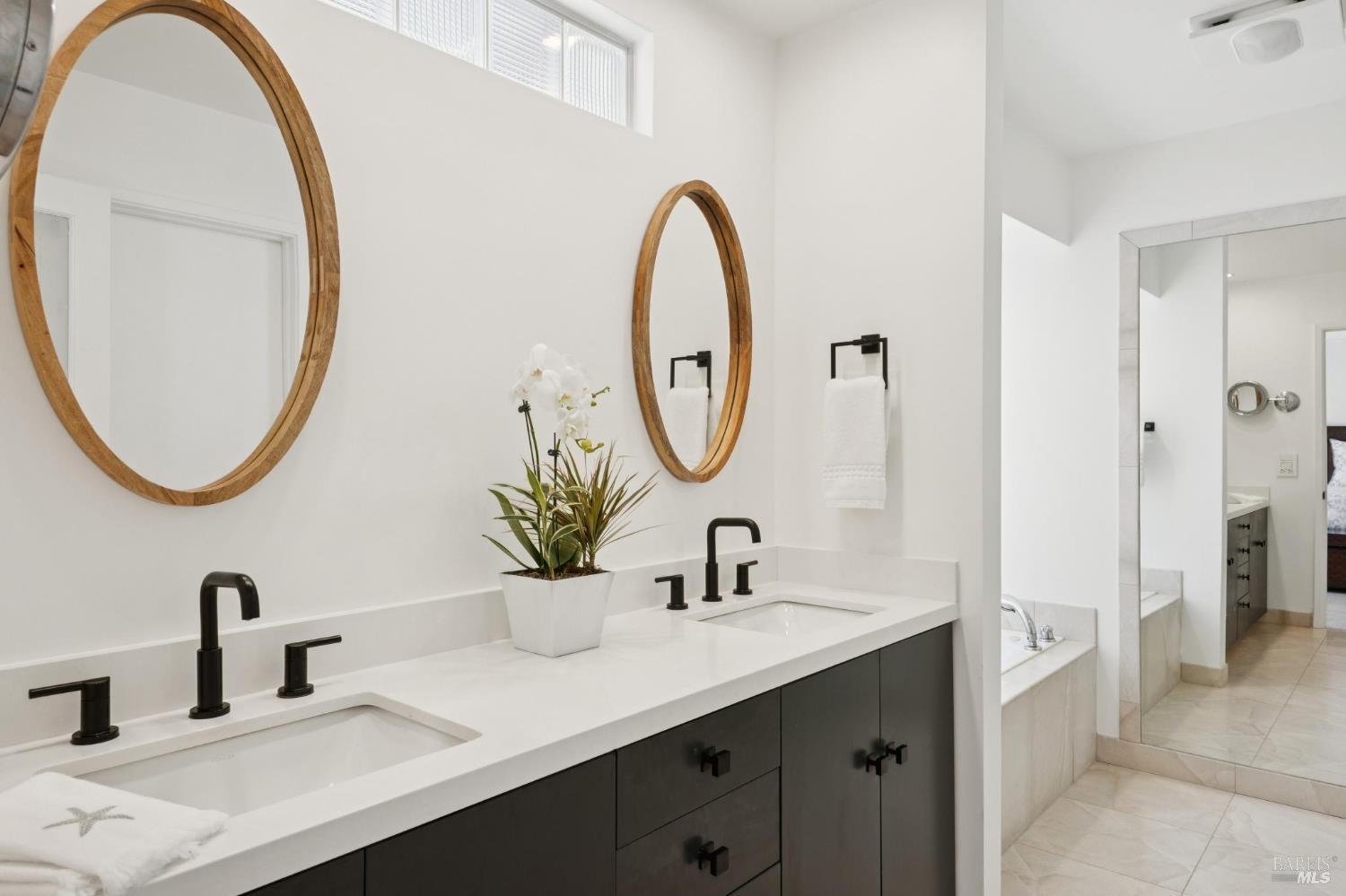 1380 Grand Avenue San Rafael, CA 94901 - Photo 27 of 46 a bathroom with a sink and a mirror
