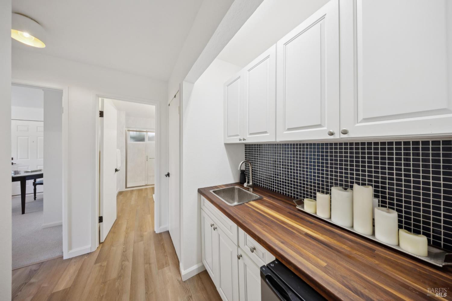 1380 Grand Avenue San Rafael, CA 94901 - Photo 31 of 46 a view of a refrigerator in kitchen and an empty room
