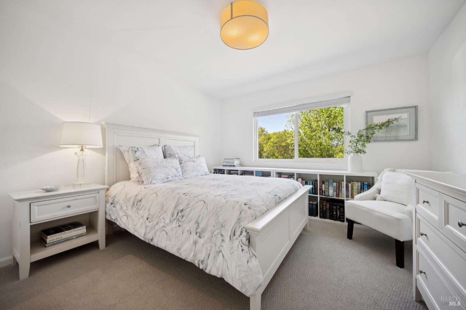 1380 Grand Avenue San Rafael, CA 94901 - Photo 35 of 46 a bedroom with a bed and a chandelier