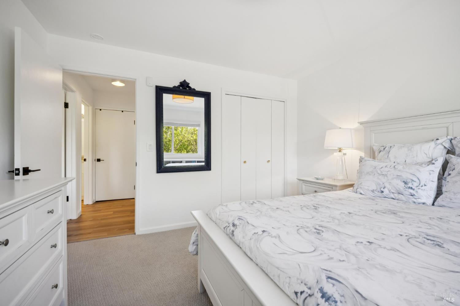 1380 Grand Avenue San Rafael, CA 94901 - Photo 36 of 46 a spacious bedroom with a bed and a walk in closet