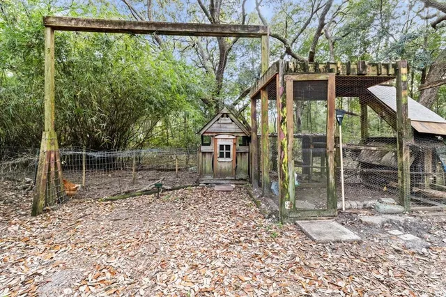 a backyard of a house with lots of green space