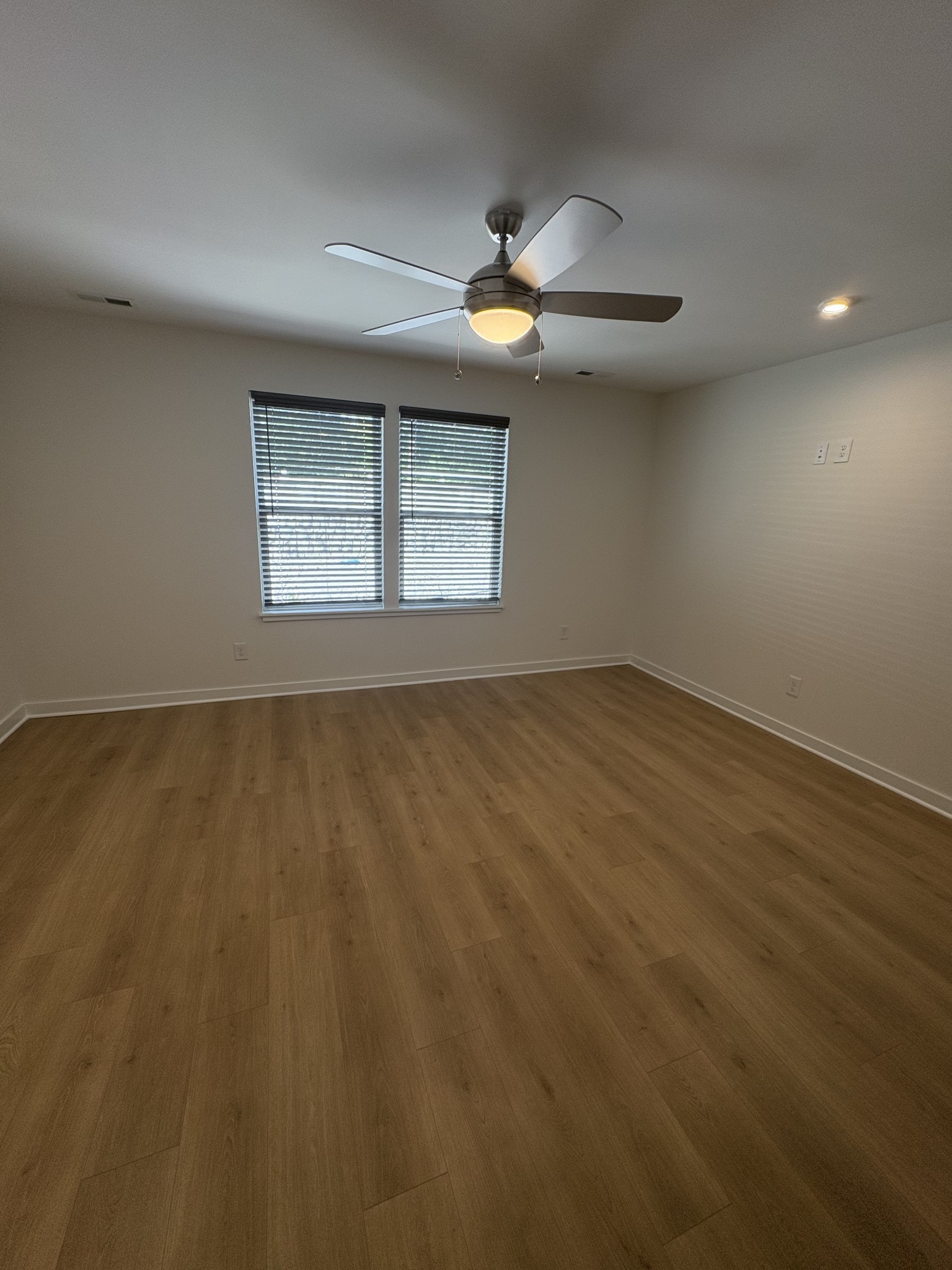 609 Wallace Road Nashville, TN 37211 - Photo 14 of 38 wooden floor in an empty room with a window