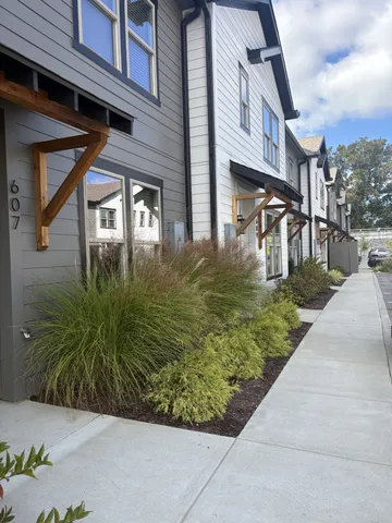 a front view of a multi story residential apartment building