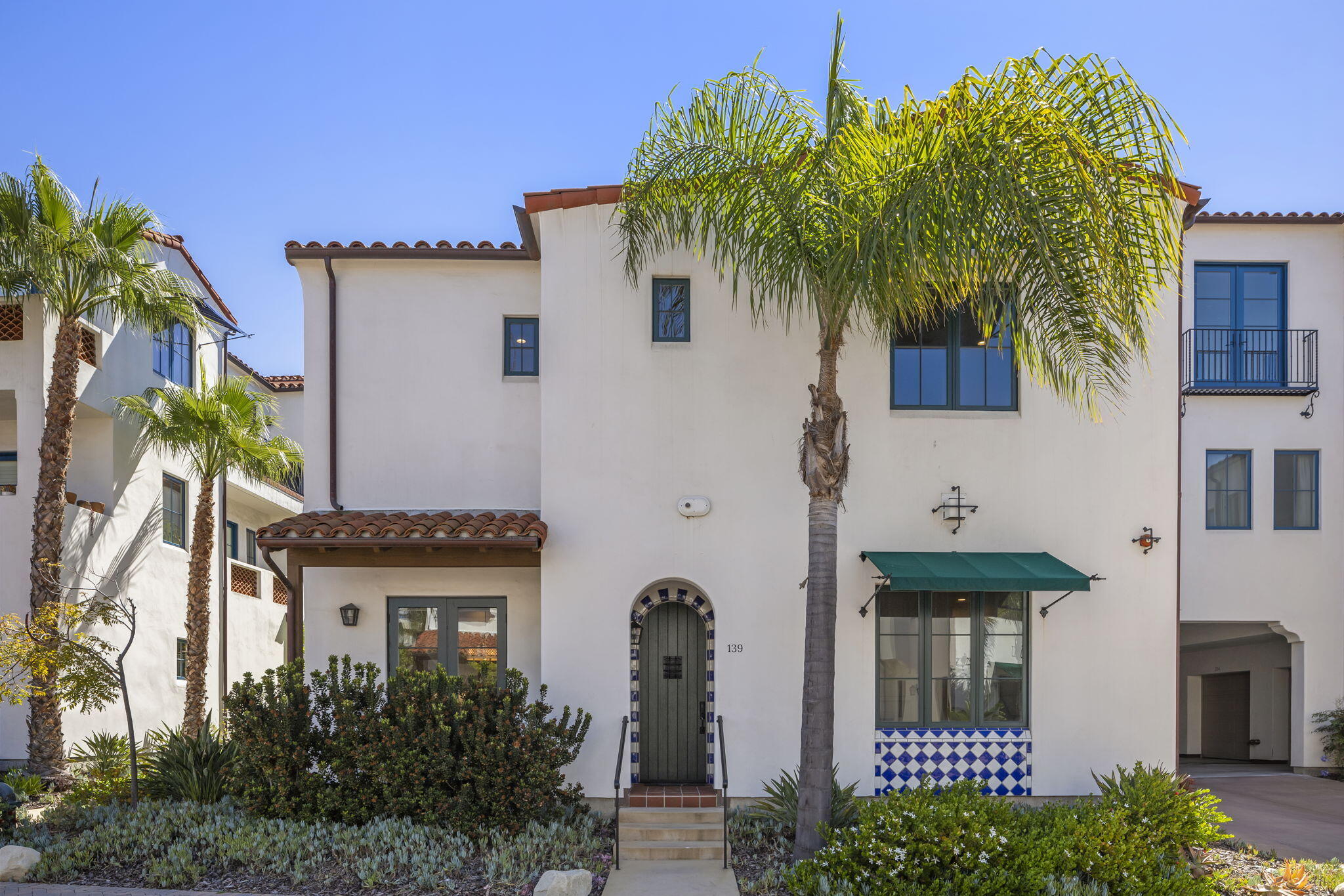 3718 State Street, Unit 139 Santa Barbara, CA 93105 - Photo 1 of 34 a front view of a house with plants